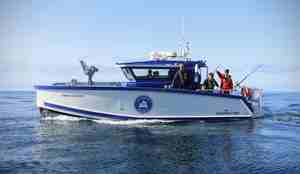 foto av forskerne i båten