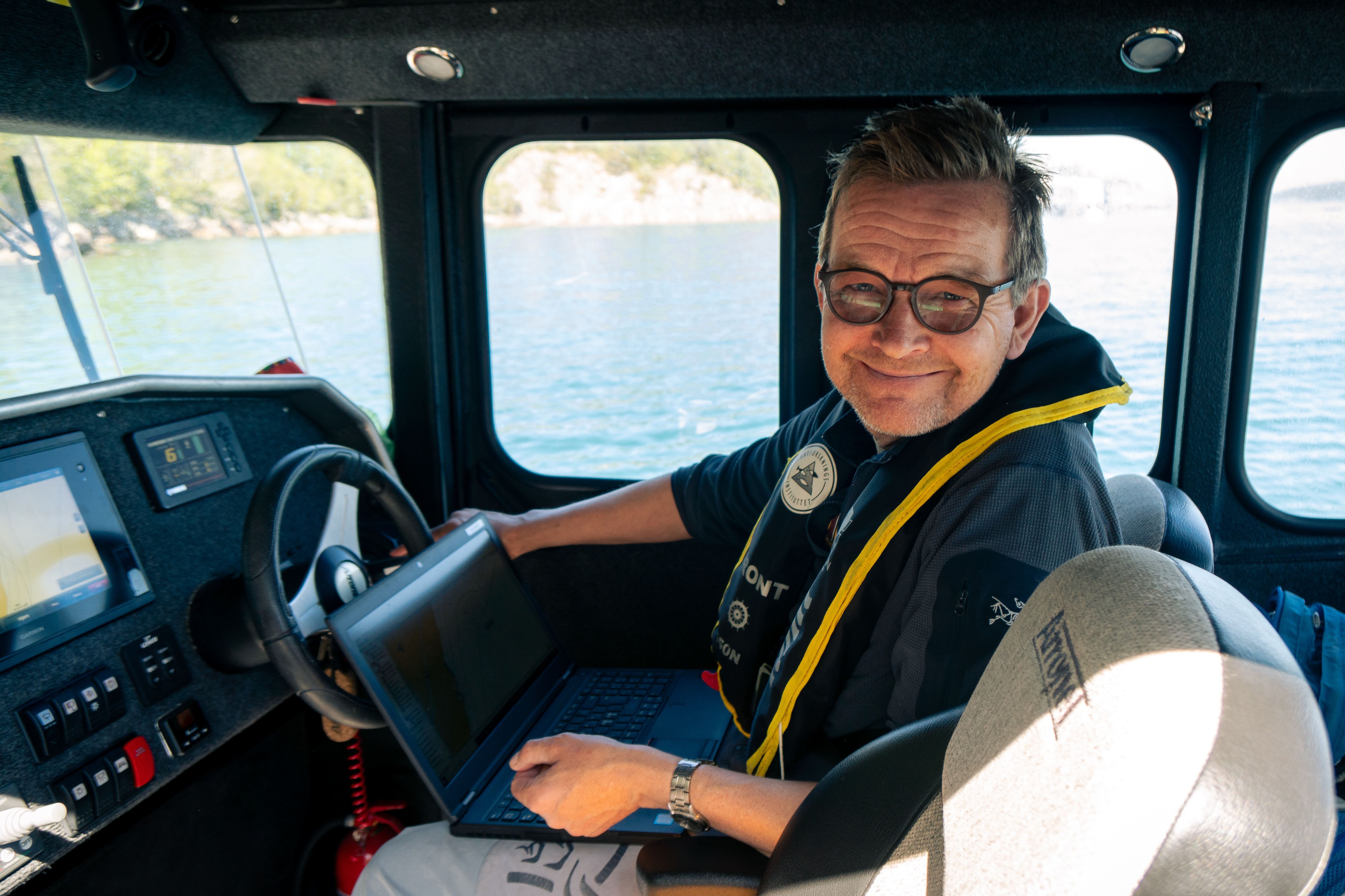Øivind Strand smiler i kamera